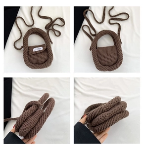 Detail view of coffee brown knit mini crossbody bag showing honeycomb texture and woven strap