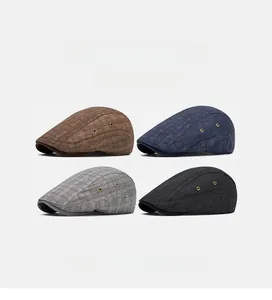 Detail view showing four colors of British plaid ivy caps with breathable side eyelets