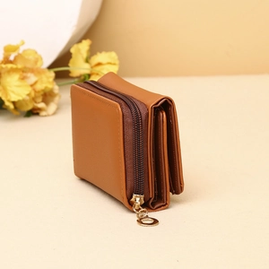 Side view of brown tri-fold PU leather wallet with a metal zipper and compact design