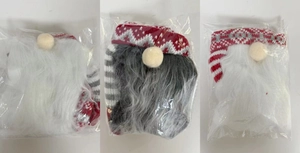 Detail of Christmas gnome wine bottle covers in festive red, white, and striped knit fabric