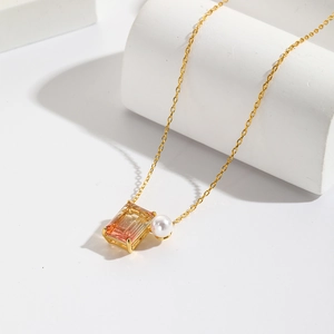 Rectangle gradient zircon and white pearl pendant on a delicate gold geometric necklace