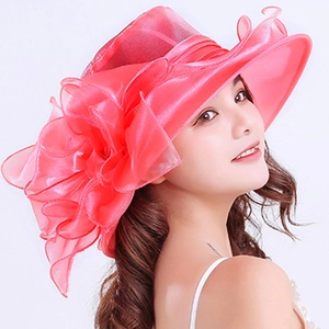 Elegant pink organza sun hat for women featuring a large floral bow for beach sun protection