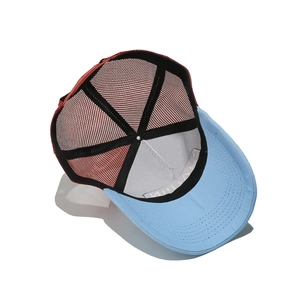 Detail view of the breathable mesh back and reinforced interior of the trucker cap