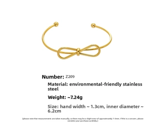 Detail of 18k gold plated stainless steel bow cuff bracelet showing dimensions and weight