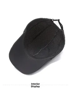 Interior view of black mesh outdoor hat featuring breathable vents and adjustable buckle