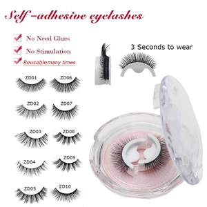 Detail of ten reusable self-adhesive eyelash styles with pink storage case and applicator