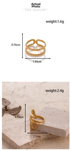 Detailed view of adjustable golden snake ring and double-layered beaded metal ring
