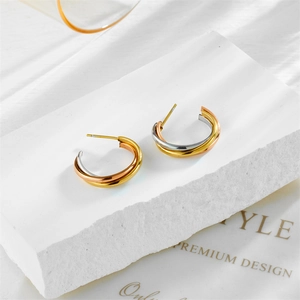 Three-tone geometric titanium steel hoop earrings in gold, silver, and rose gold finish
