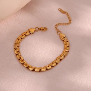 Detail of 6.2mm gold square link chain with adjustable lobster clasp and S.STEEL stamp