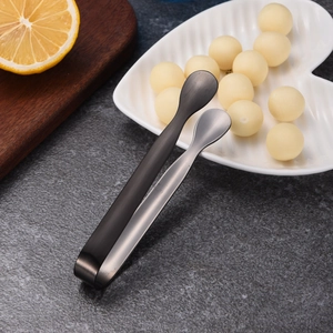 Thickened 304 stainless steel sugar and ice tongs with black and silver finish on stone desk