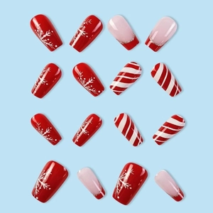 Christmas coffin press-on nails with red snowflakes, candy stripes and glitter finish