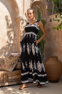 Detail view of black and white ethnic print beach maxi dress with smocked bodice