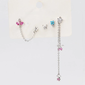 Detailed view of silver flower earrings with pink and blue zircons and long tassels