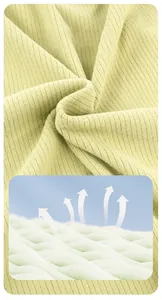 Detail of light green ribbed knit pet fabric showing high breathability and texture