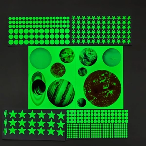 Glow in the dark space wall stickers featuring luminous planets stars and circular dots