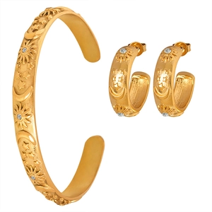 Golden sun and moon embossed jewelry set with zircon star earrings and bangle