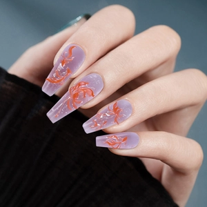 3D lily relief on long coffin nails with translucent purple base and orange accents