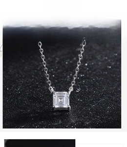 Macro detail of square-cut cubic zirconia pendant with secure four-prong setting