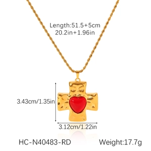 Detail of hammered cross pendant with red heart on twist chain and size measurements