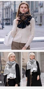 Street style view of women's warm cashmere-like scarves with fringe and patterns