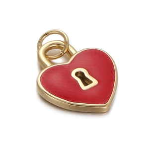 Close-up of a red heart-shaped lock pendant with golden borders on white background