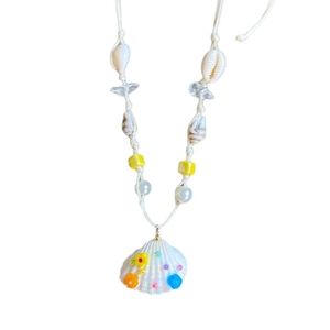 Wax cord necklace with starfish, shell, and pearl pendant in bohemian beach style