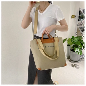 Retro canvas tote bag in khaki with brown leather trim and wide shoulder strap