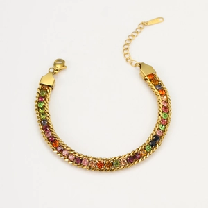 Close-up of golden bracelet featuring vibrant multi-colored rhinestones and lobster clasp