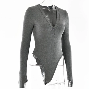 Detail of grey ribbed knit bodysuit with deep V-neck button placket and thumbhole cuffs