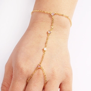 Elegant 18k gold finger bracelet with multiple pink heart-shaped gemstones for women