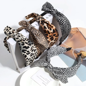 Detailed collection of five leopard print bow headbands with fabric wrap and chic style