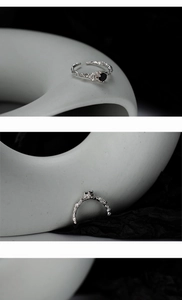 Detailed macro view of S925 silver ring featuring molten texture and a black zircon stone