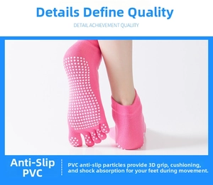 Detailed macro view of white PVC anti-slip dots on pink open-toe five-finger yoga socks