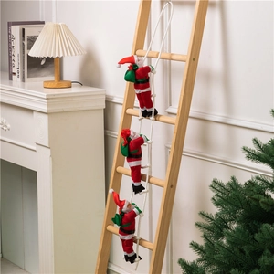 Three climbing Santa Clauses on rope ladder hanging decoration for Christmas home decor