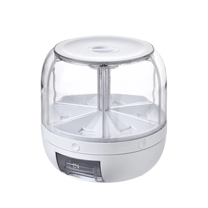 Modern white rotating grain storage container with transparent multi-compartment dispenser