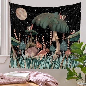 Detail of mushroom and snail tarot tapestry hanging as cozy room decor backdrop