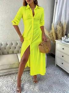 Elegante abito a camicia giallo neon a maniche lunghe con bottoni su modella in piedi