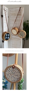 Detail of four handmade rattan round crossbody bags with unique shell inlay patterns