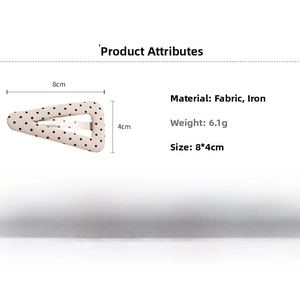 Fermaglio per capelli a triangolo a pois con dimensioni 8x4cm e peso 6.1g dettagli