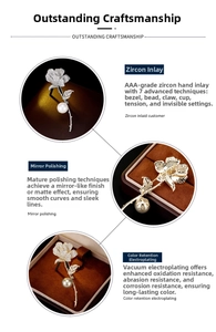 Macro details of zirconia rose brooch with pearl accents and mirror polish finish
