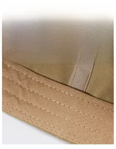 Detail view of the wide moisture-wicking sweatband inside this khaki baseball cap
