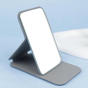 Portable folding makeup mirror with gray PU leather cover and adjustable stand