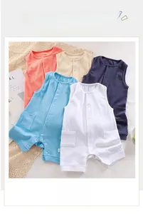 Flat lay detail of striped cotton baby bodysuits with front snaps and small pockets