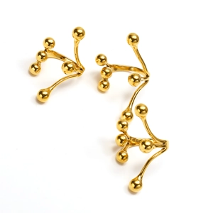 Detail of 18k gold plated titanium steel branch earrings with polished beads design