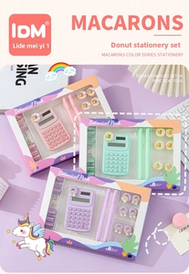 Macro detail of macaron-colored stationery set with mini calculator and cute clips