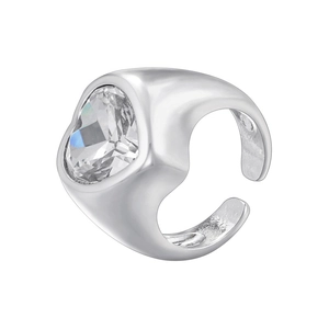 Macro shot of a silver heart-shaped gemstone ring with polished finish and open design