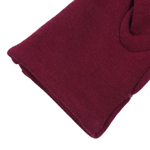 Close-up of the ribbed cuff and stitching on a burgundy winter thermal cycling glove