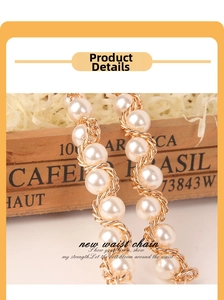 Macro detail of retro pearl waist chain with golden wire weave on vintage wooden box