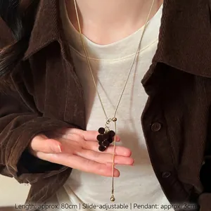 Detail of flocking grape pendant necklace with adjustable 80cm chain for women