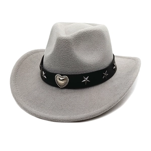 Detail of grey cowboy hat featuring a leather band with silver heart and star metal rivets